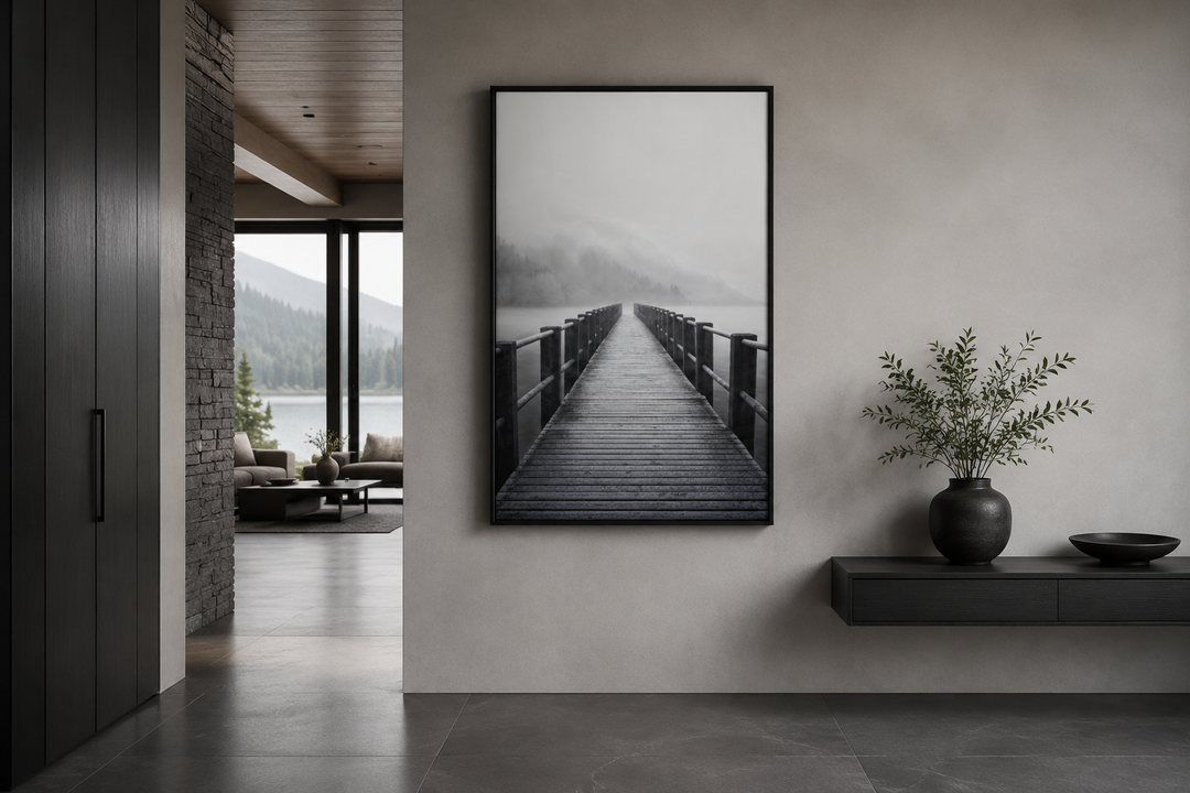 Vertical framed canvas wall art of a foggy black and white lake landscape with a wooden dock.