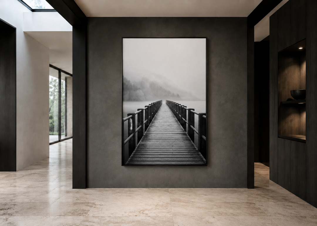 Vertical framed canvas wall art of a foggy black and white lake landscape with a wooden dock.
