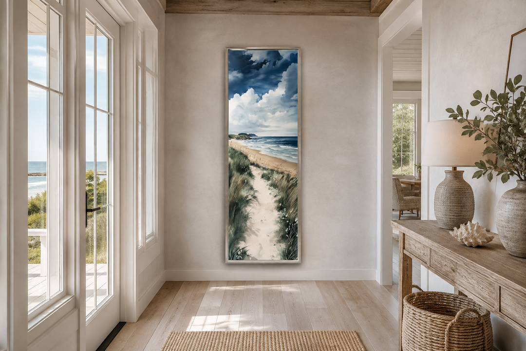 Tall narrow vertical framed canvas wall art featuring a coastal beach path with dunes and ocean.