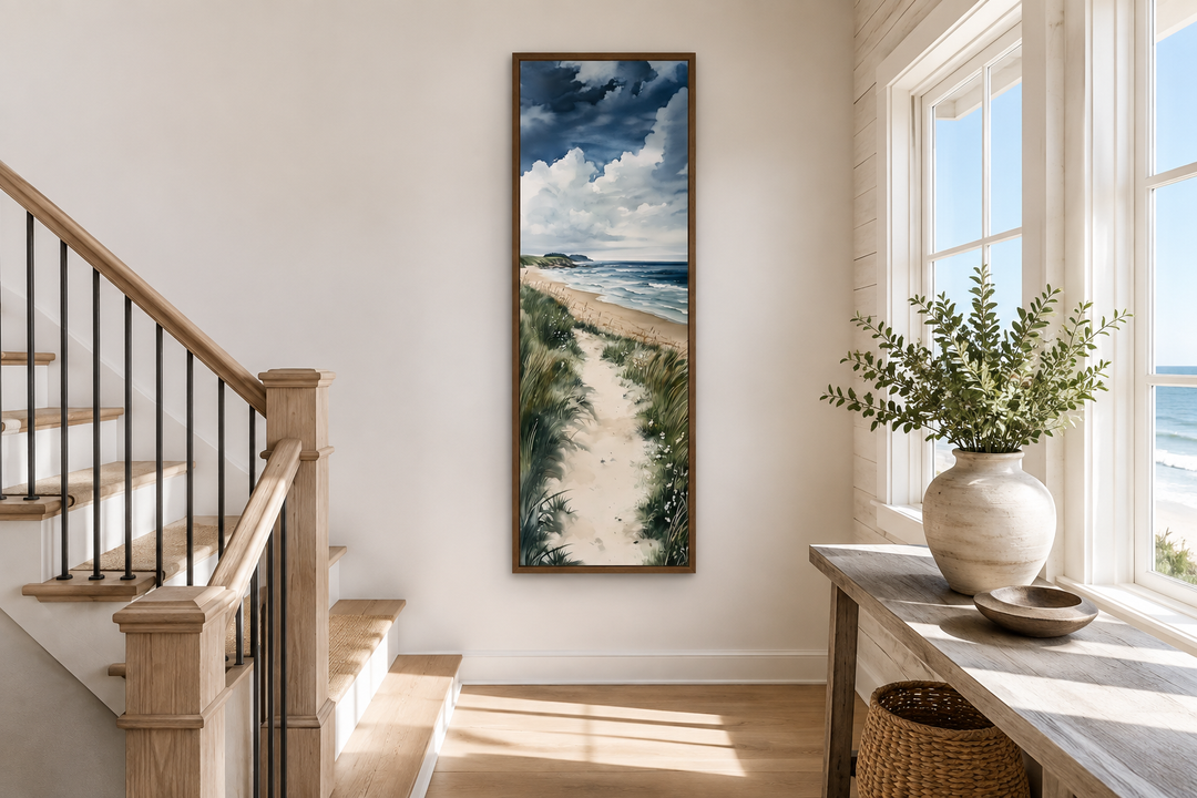 Tall narrow framed canvas wall art featuring a vertical coastal beach scene with dunes and ocean.