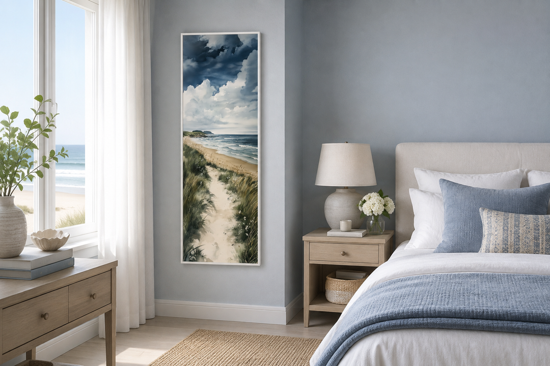 Vertical framed canvas wall art of a coastal seashore path with sand dunes and blue ocean waves.