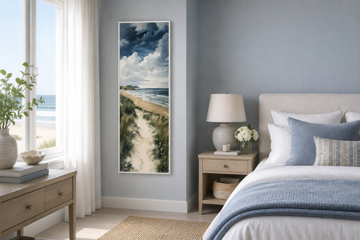 Vertical framed canvas wall art of a coastal seashore path with sand dunes and blue ocean waves.