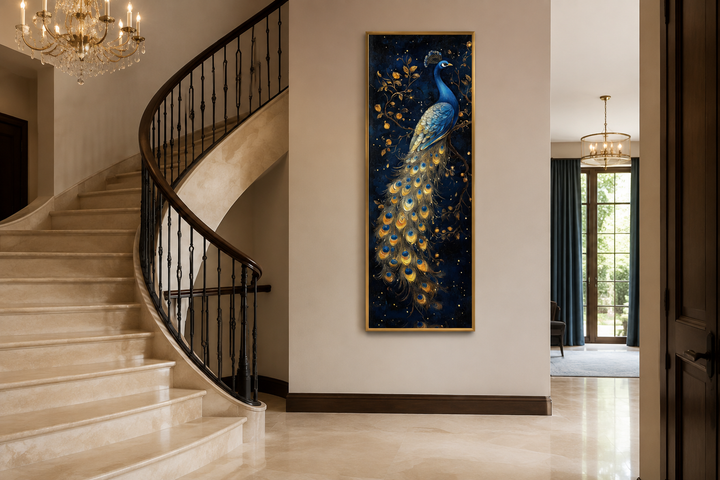 Tall narrow vertical framed canvas wall art of a blue and gold peacock on a navy background.