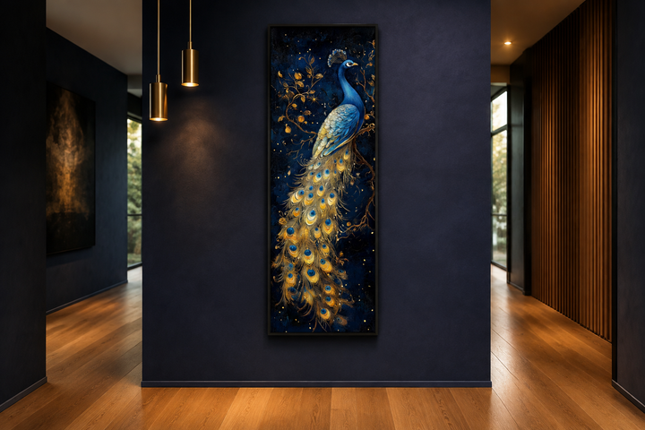Tall narrow framed canvas wall art of a blue and gold peacock on a dark navy background.
