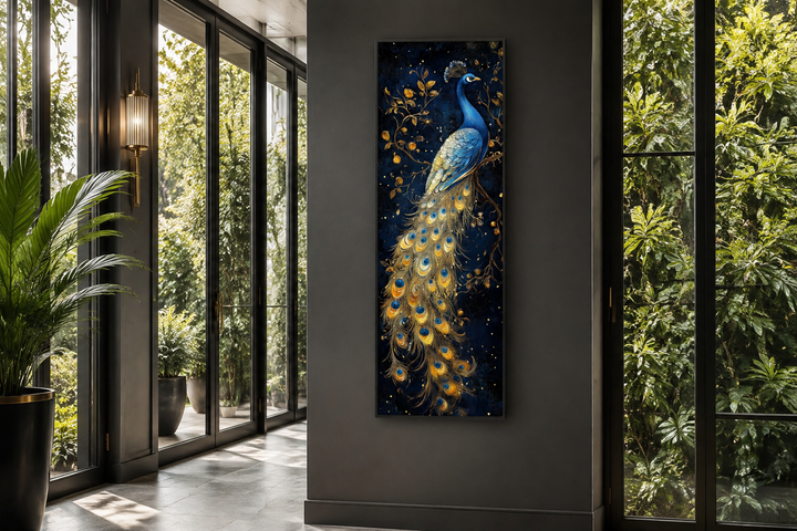 Tall narrow vertical framed canvas wall art featuring a blue and gold peacock on a navy background.