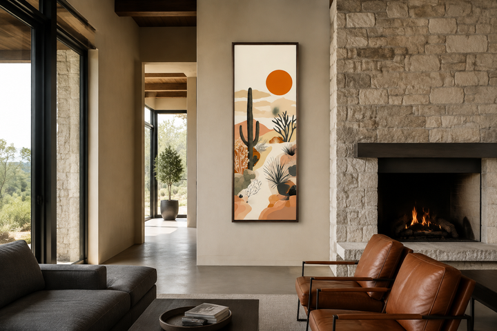 Tall narrow framed canvas wall art featuring a desert cactus landscape under a bright orange sun.