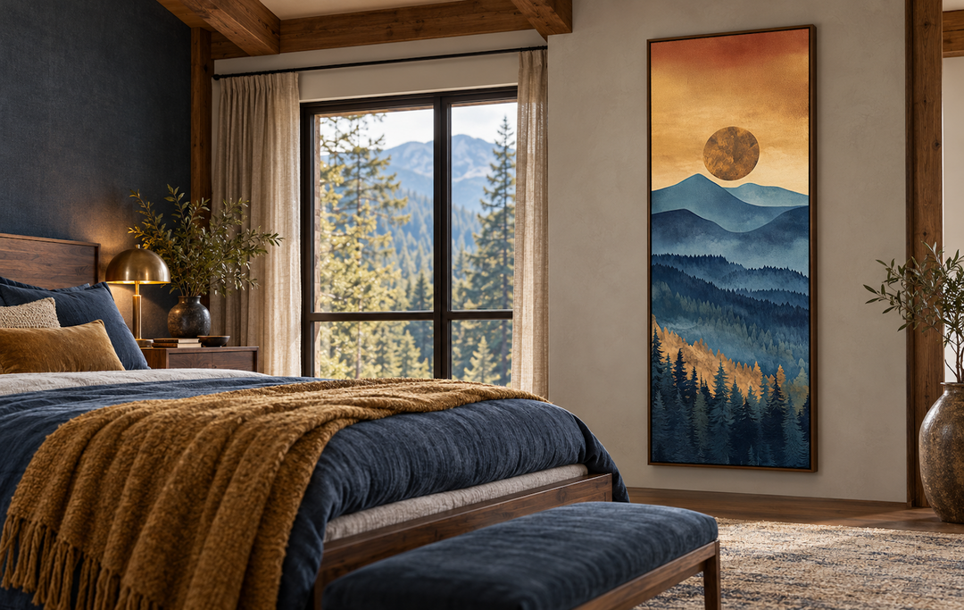 Tall narrow vertical canvas wall art of a mountain sunset in a bedroom with blue and gold bedding.