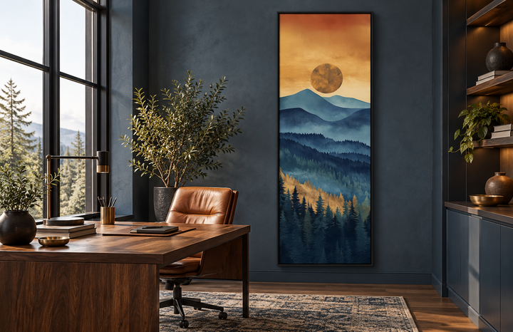 Tall narrow vertical canvas wall art of a mountain sunset in a modern home office with dark walls.