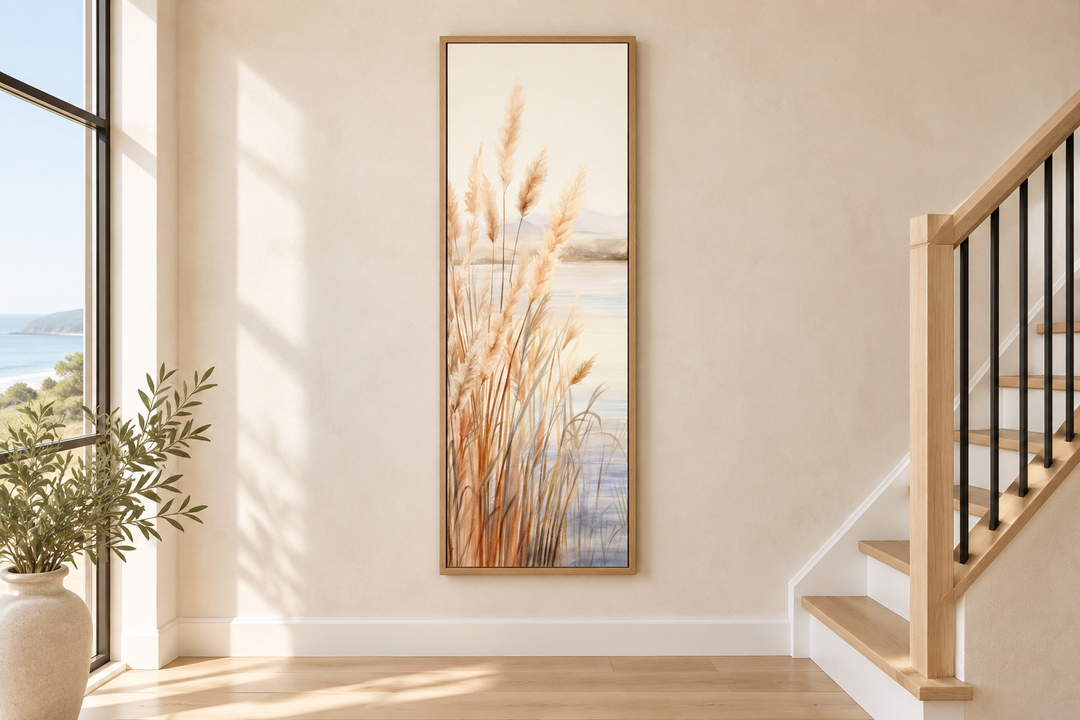 Vertical framed canvas wall art featuring neutral pampas grass against a beach backdrop.