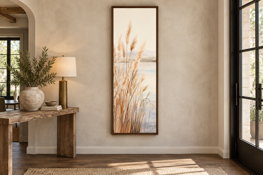 Vertical framed canvas wall art featuring neutral-toned pampas grass against a beach background.