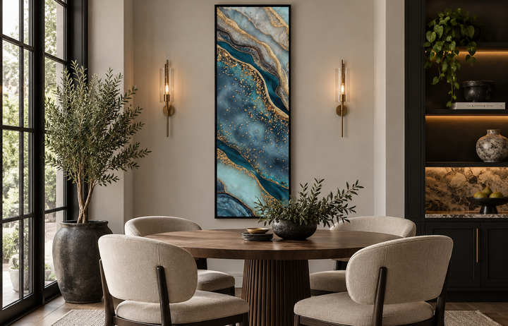 Tall narrow vertical abstract canvas print with teal, blue, and gold marble-inspired flowing bands.