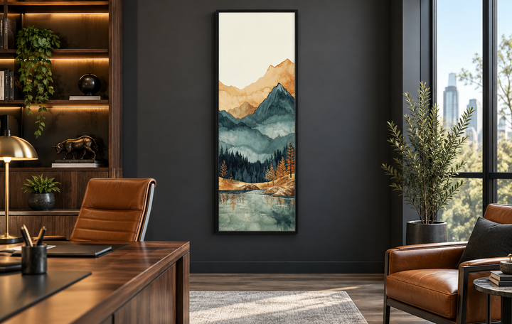Tall narrow vertical canvas wall art of a mountain landscape with a lake and forest in an office.