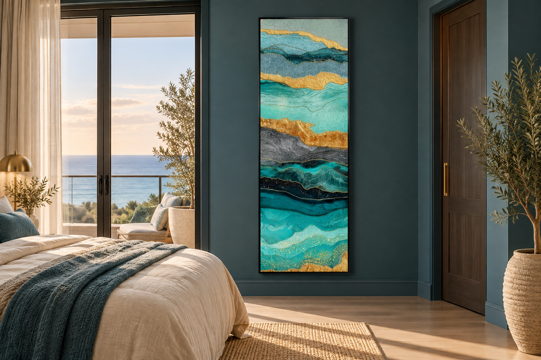 Tall narrow vertical teal and gold ocean abstract canvas wall art in a modern bedroom setting.