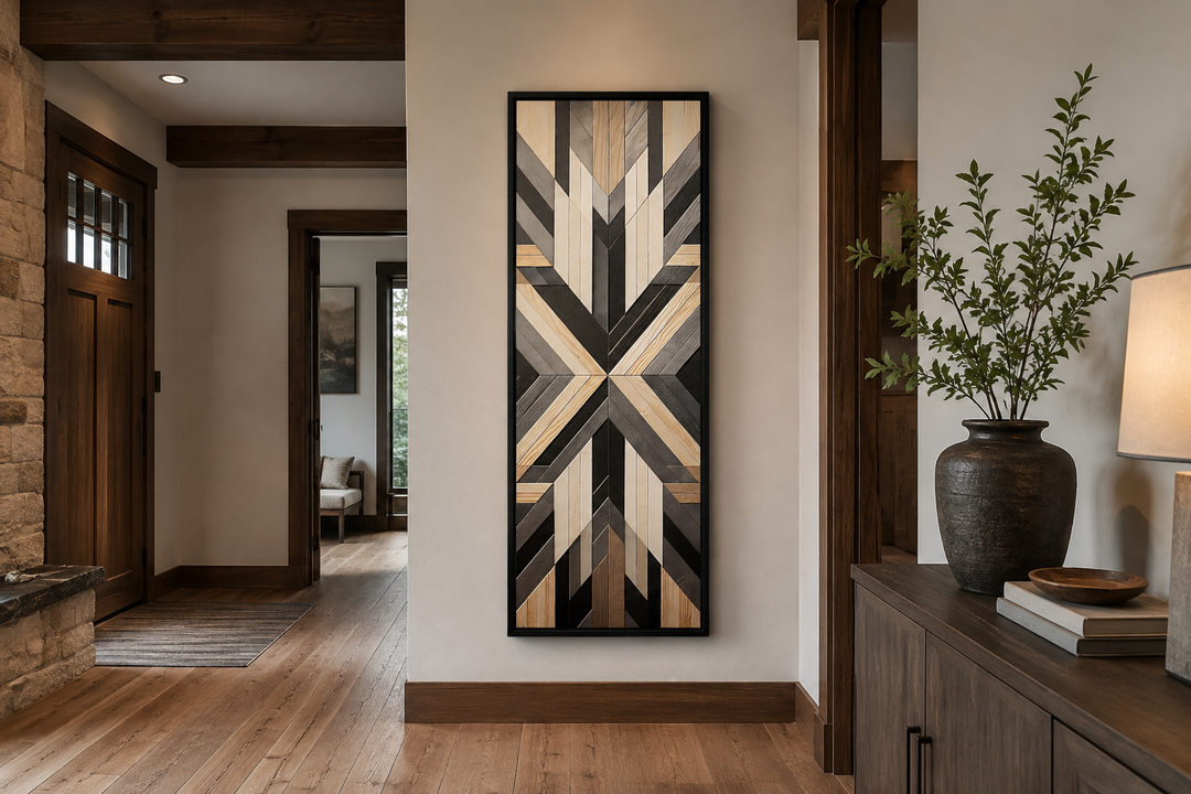 Tall narrow vertical wall art with neutral brown Aztec geometric patterns in a black frame.