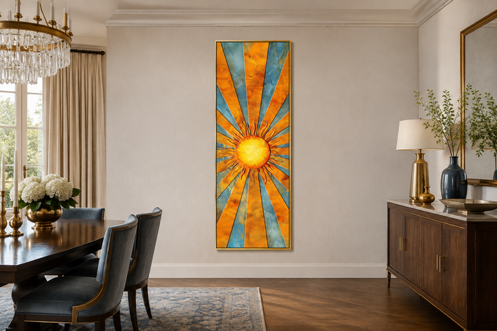 Vertical narrow framed canvas wall art featuring a yellow sun with blue rays in a dining room.