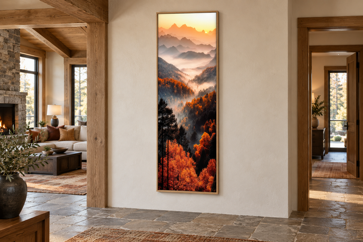Tall vertical canvas art of a foggy autumn mountain forest at sunset, framed on a neutral wall.