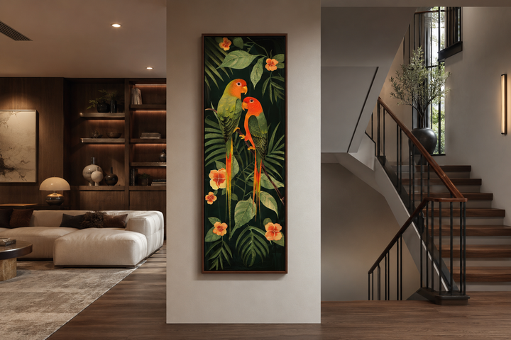 Tall vertical framed canvas art of two colorful tropical birds perched among lush jungle leaves.