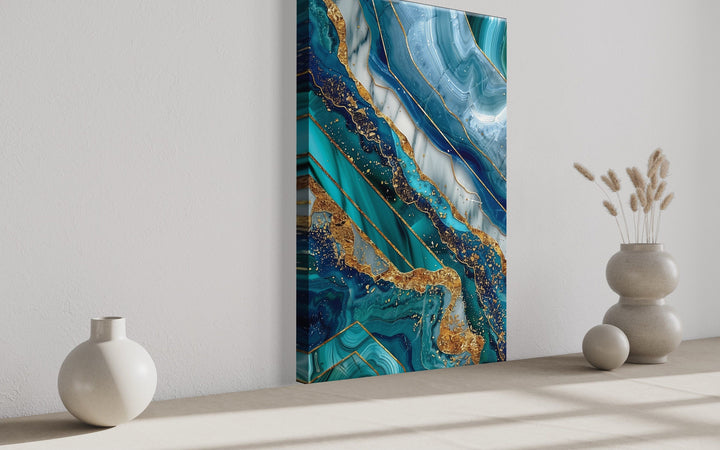 Teal and gold abstract marble framed canvas wall art displayed in a modern living room setting.