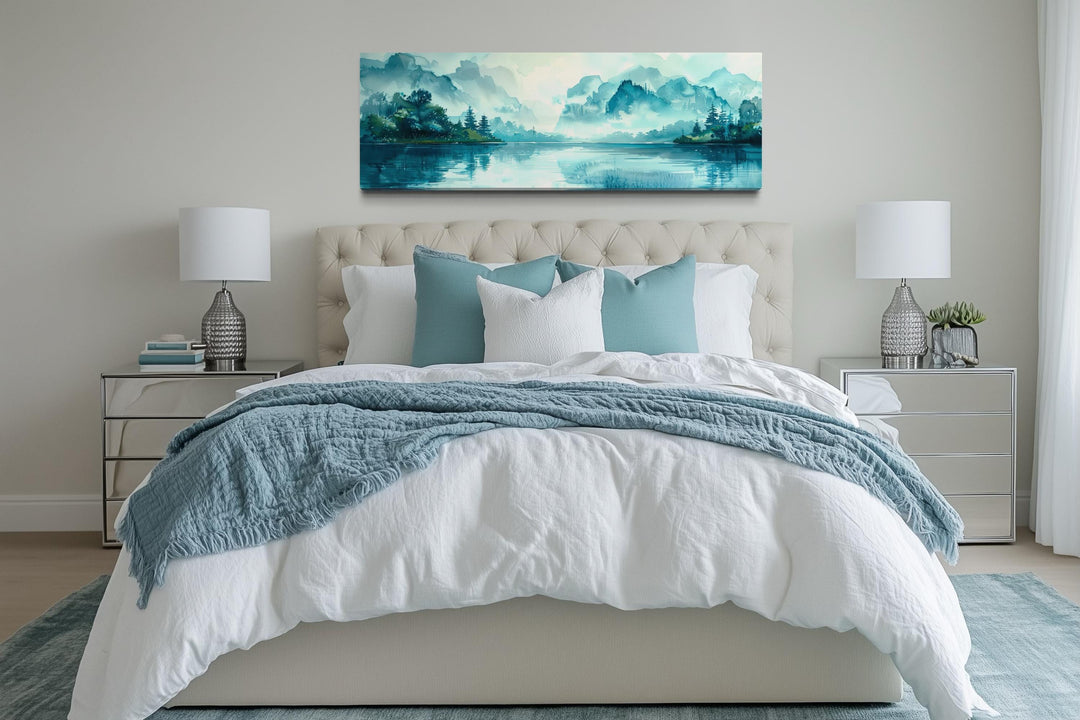 Teal mountain lake horizontal canvas wall art hanging above a bed in a modern bedroom.
