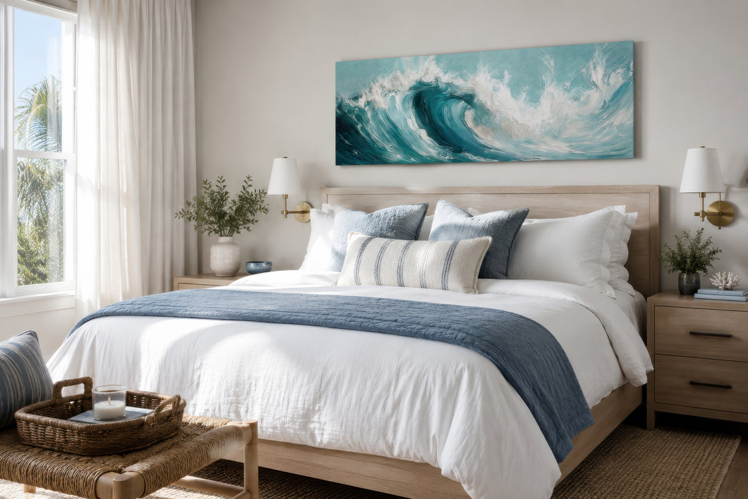 Teal ocean wave coastal horizontal framed canvas wall art hanging over a bed in a modern bedroom.