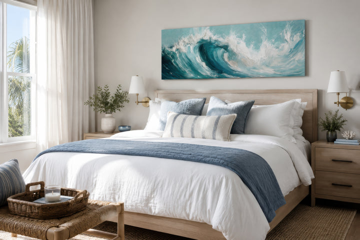 Teal ocean wave coastal horizontal framed canvas wall art hanging over a bed in a modern bedroom.