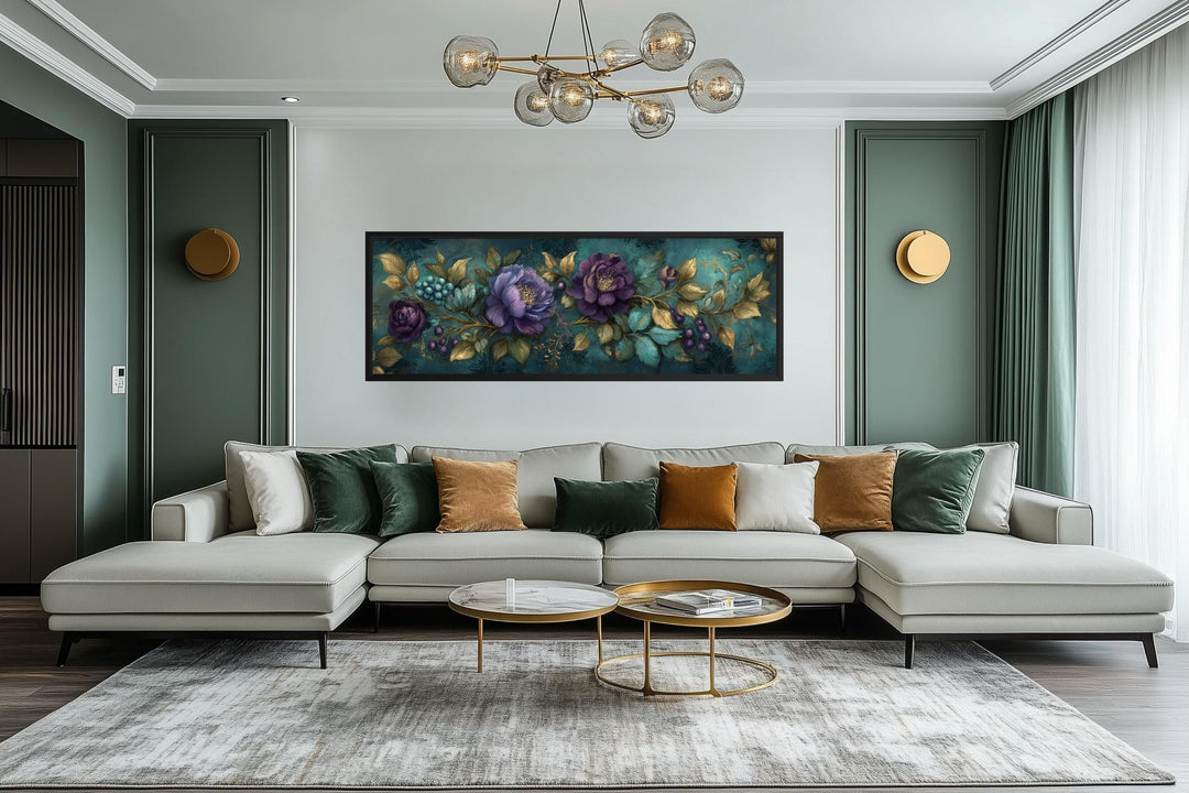 Teal and purple peony wall art with gold leaf accents in a wide horizontal frame above a sofa.