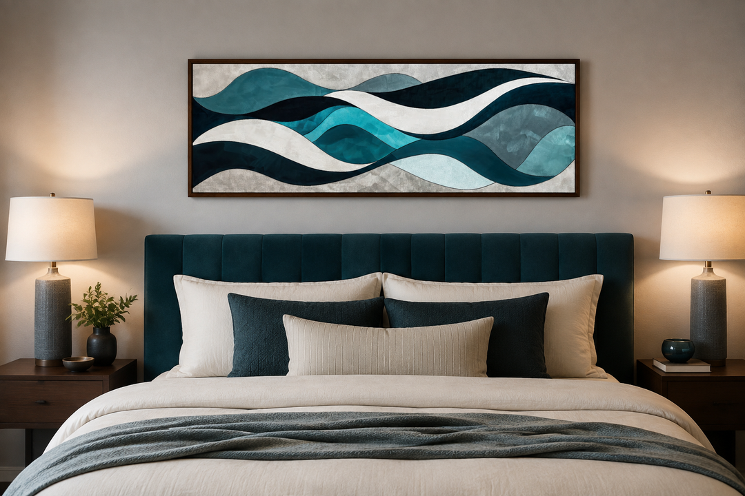 Teal blue and grey abstract waves long horizontal wall art framed above a bed in a modern bedroom.