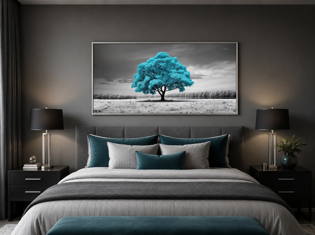 Teal tree on black and white background framed canvas wall art hanging above a bed.