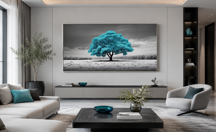 Framed canvas wall art of a vibrant teal tree on a black and white landscape background.