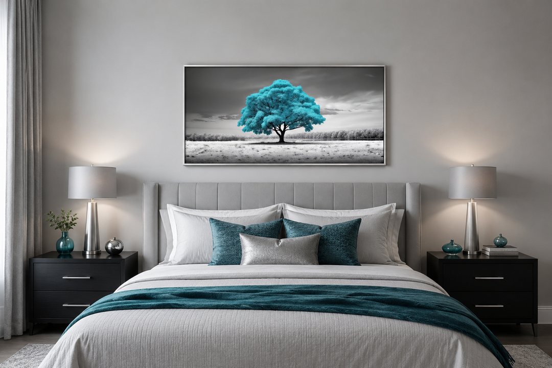 Teal tree on black and white background framed canvas wall art hanging above a bed.