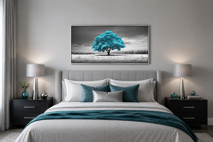 Teal tree on black and white background framed canvas wall art hanging above a bed.