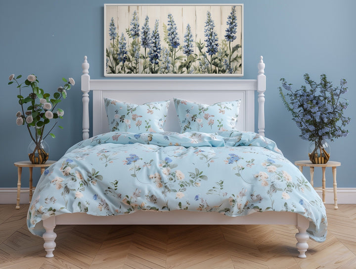Texas Bluebonnets painted on wood rustic framed canvas wall art hanging above a white bed.