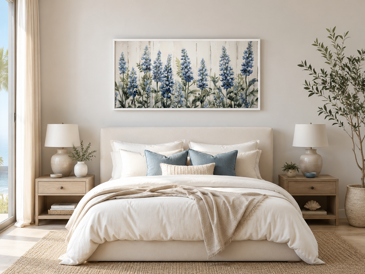 Texas Bluebonnets painted on wood rustic framed canvas wall art hanging above a neutral bed.
