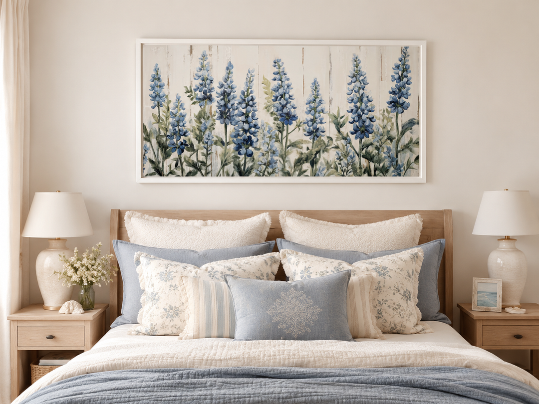 Texas Bluebonnets painted on wood rustic framed canvas wall art hanging above a bed.