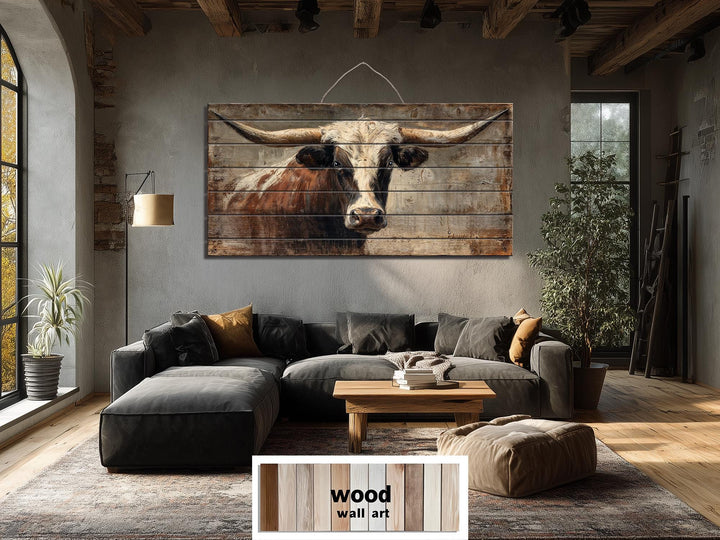 Large horizontal wood wall art featuring a rustic Texas longhorn bull portrait for a living room.