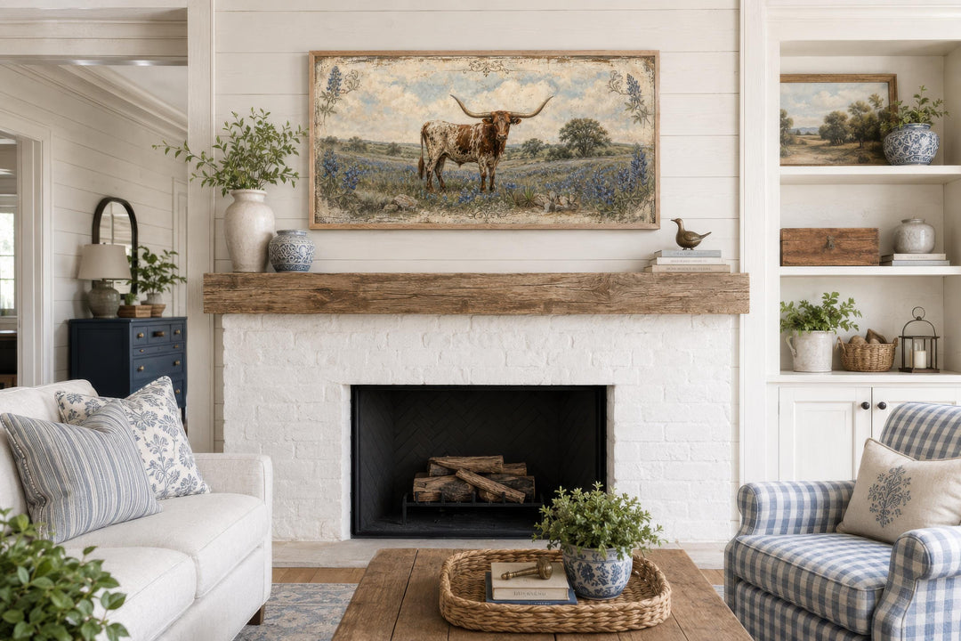 Texas Longhorn wall art canvas print featuring bluebonnets in a rustic farmhouse living room.
