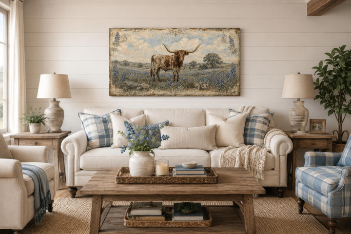Rustic Texas Longhorn canvas wall art featuring bluebonnets in a farmhouse living room setting.