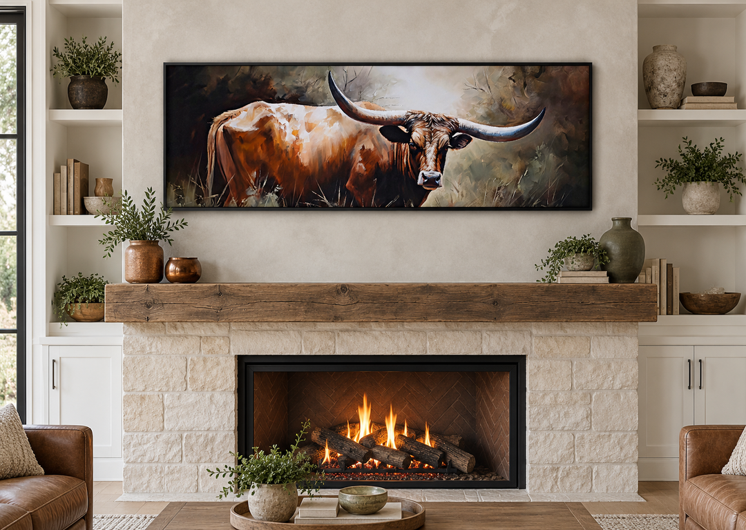 Texas Longhorn Steer panoramic framed canvas wall art displayed above a rustic stone fireplace.