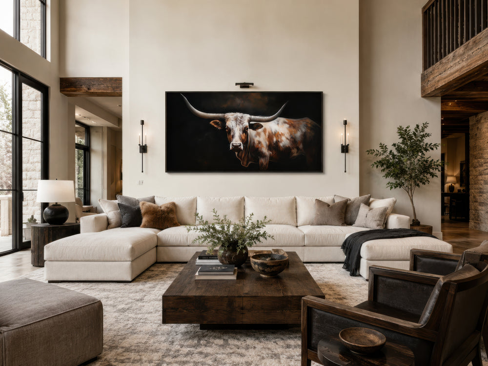 Extra large framed canvas wall art of a Texas Longhorn cow in a rustic farmhouse living room.