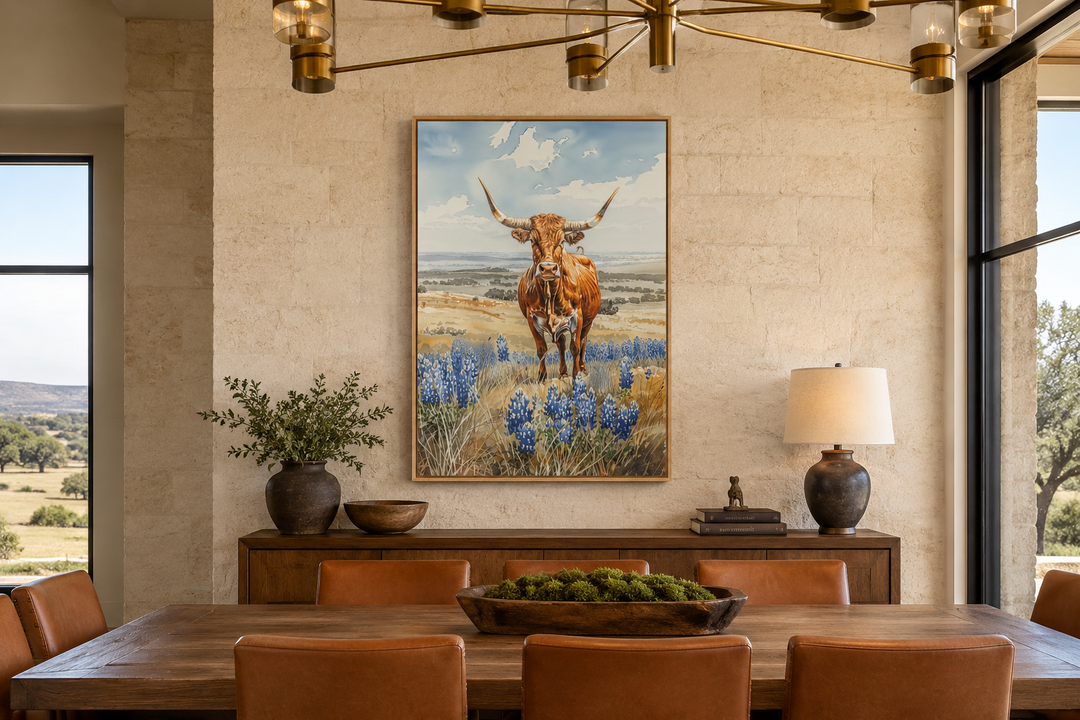 Vertical framed canvas wall art of a Texas longhorn cow in a field of bluebonnets.