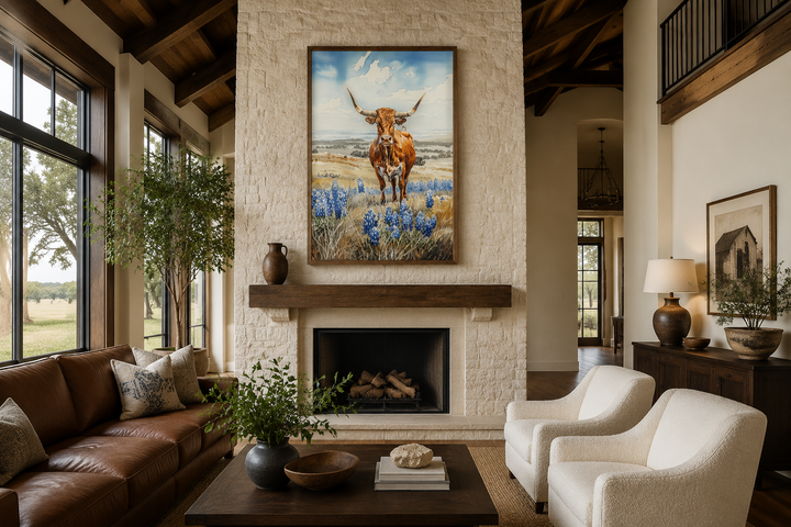 Texas longhorn cow in bluebonnets field vertical framed canvas wall art above a stone fireplace.