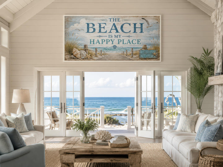 The Beach Is My Happy Place Sign Coastal Beach House Wall Art above a sofa in a beach house.