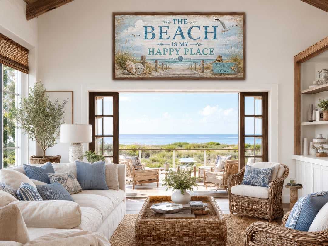 The Beach Is My Happy Place Sign Coastal Beach House Wall Art above a sofa in a beach house room.