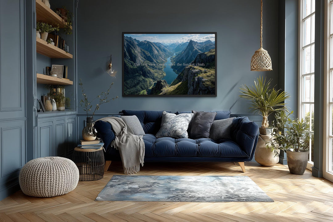 Wall art with a mountain landscape and the quote "The best view comes after the hardest climb."