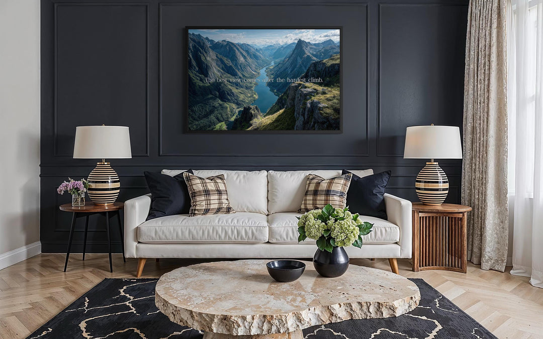 Wall art with a mountain landscape and the quote "The best view comes after the hardest climb."