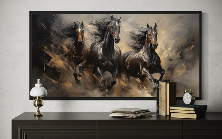 Extra large canvas wall art featuring three brown horses galloping with flowing manes.