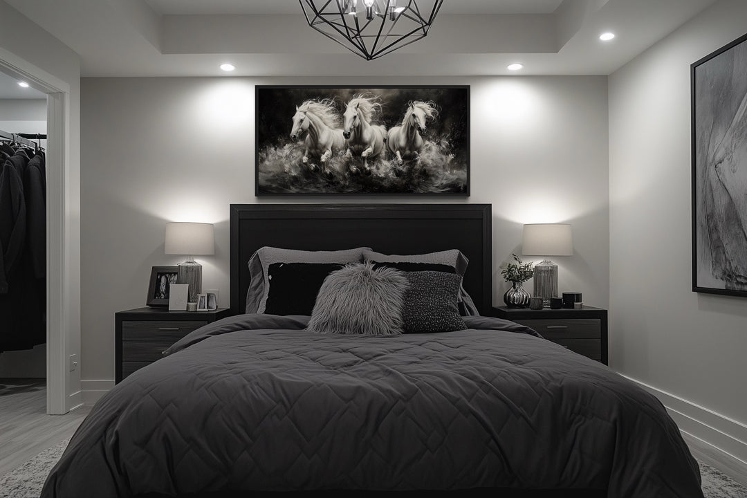 Three White Horses Running Framed Canvas Wall Art displayed above a bed in a modern bedroom.