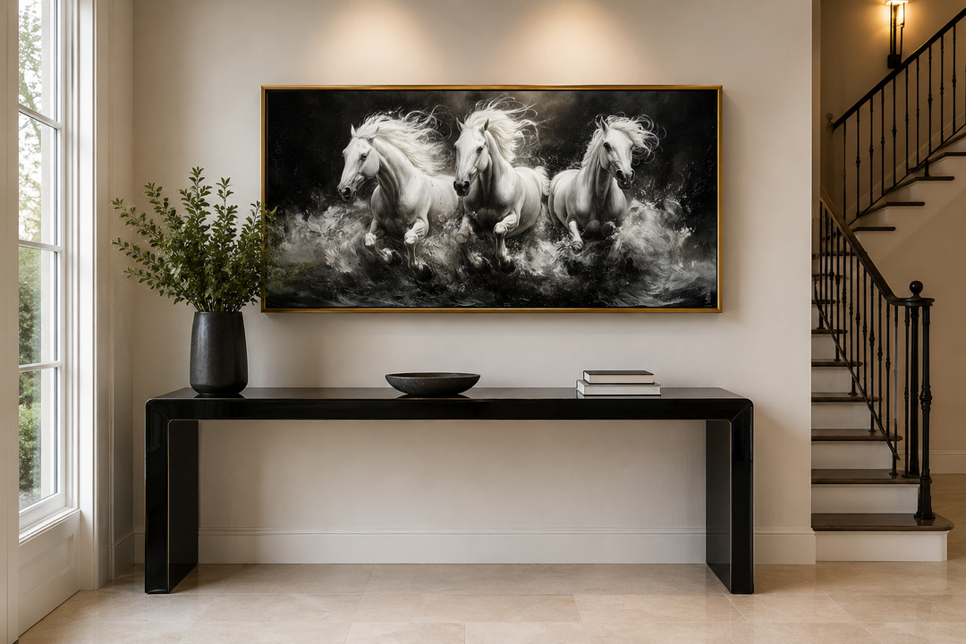 Extra large framed canvas wall art of three white horses running against a dark background.