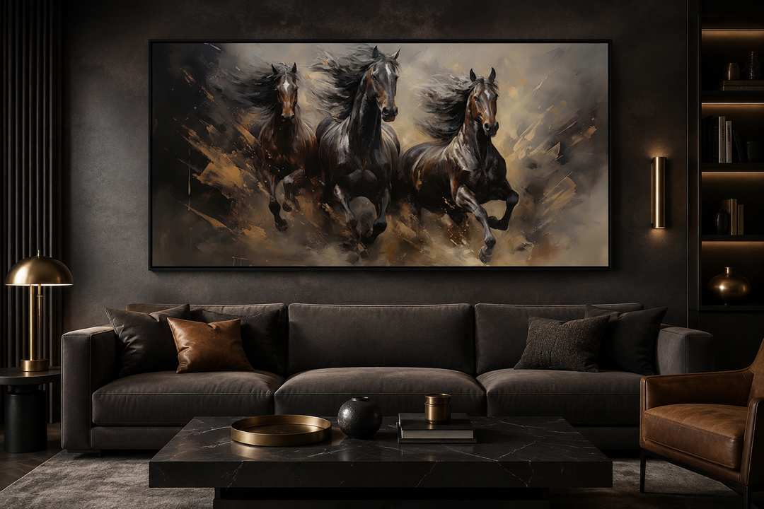 Three horses running extra large canvas wall art hanging above a dark sofa in a modern living room.