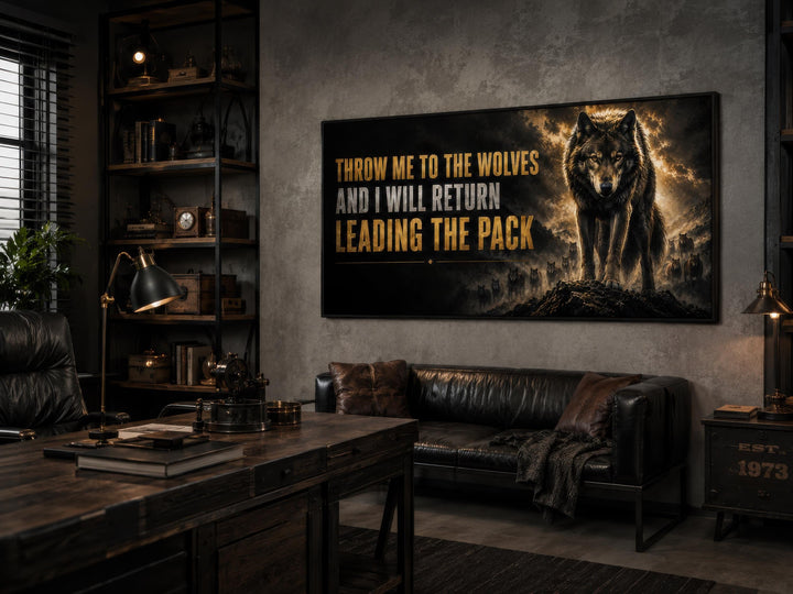Throw Me To The Wolves motivational canvas art in a dark, masculine office with a leather sofa.